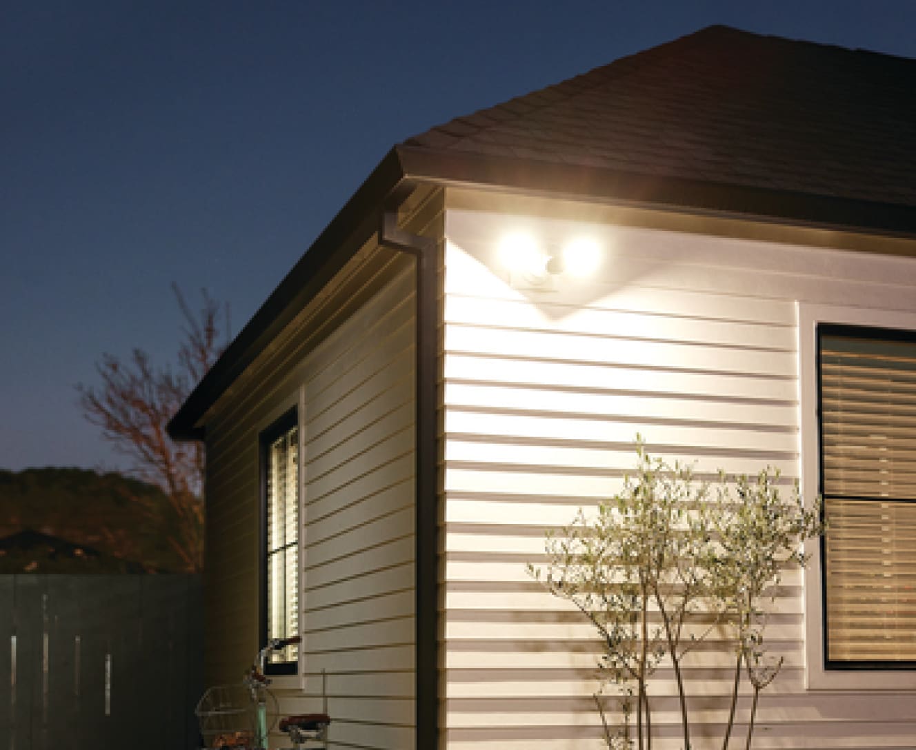 Google Nest Cam with floodlight on a house Google Nest Cam with floodlight on a house