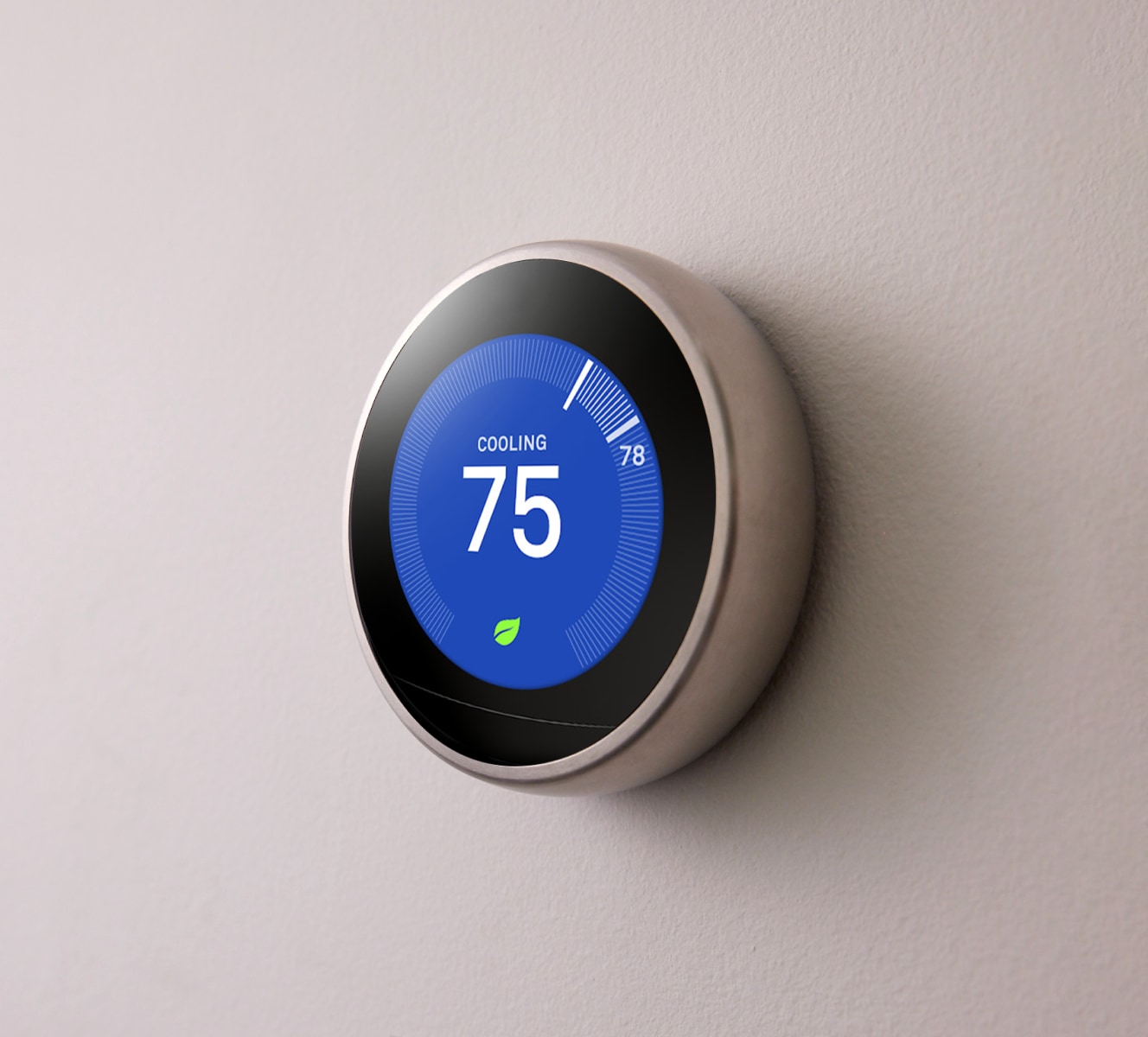 Google Nest Learning Thermostat on a wall Google Nest Learning Thermostat on a wall