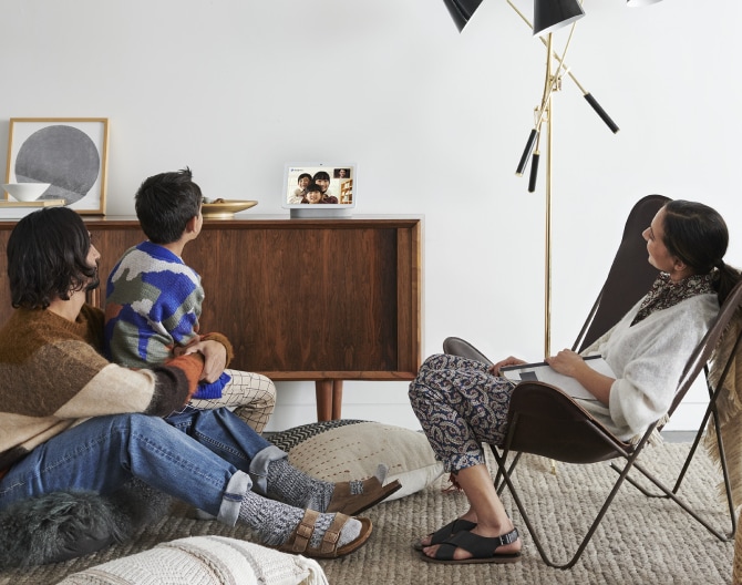 Family doing a Google Meet video call on their Google Nest Hub Max Family doing a Google Meet video call on their Google Nest Hub Max