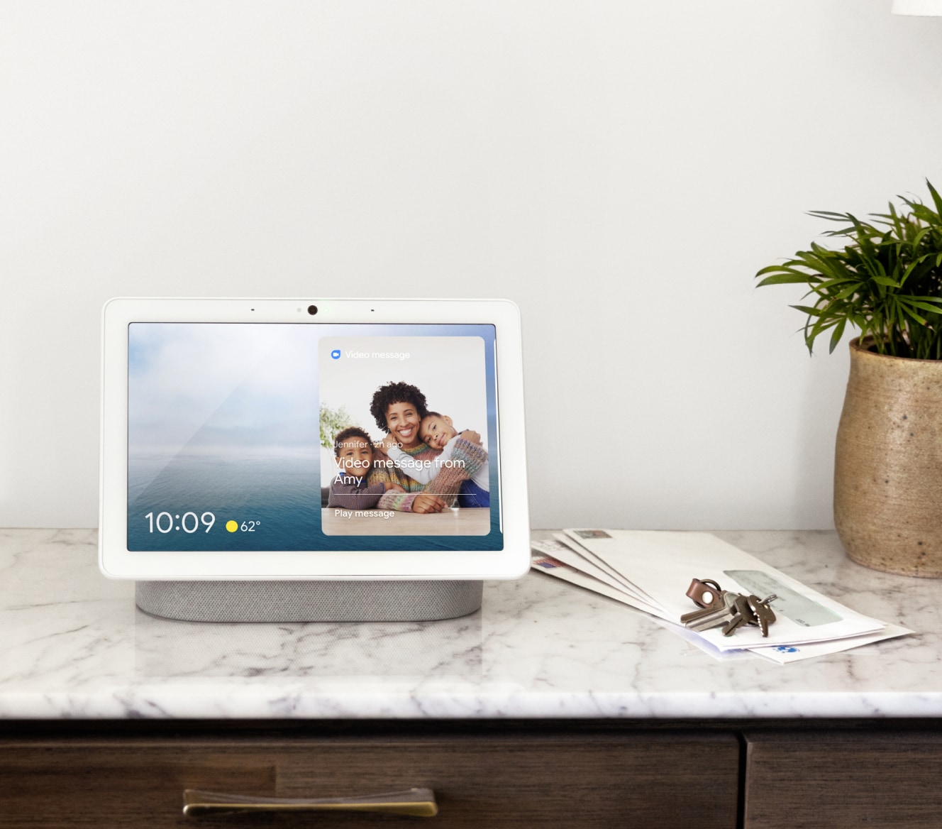 Google Nest Hub Max showing the home screen on a countertop Google Nest Hub Max showing the home screen on a countertop