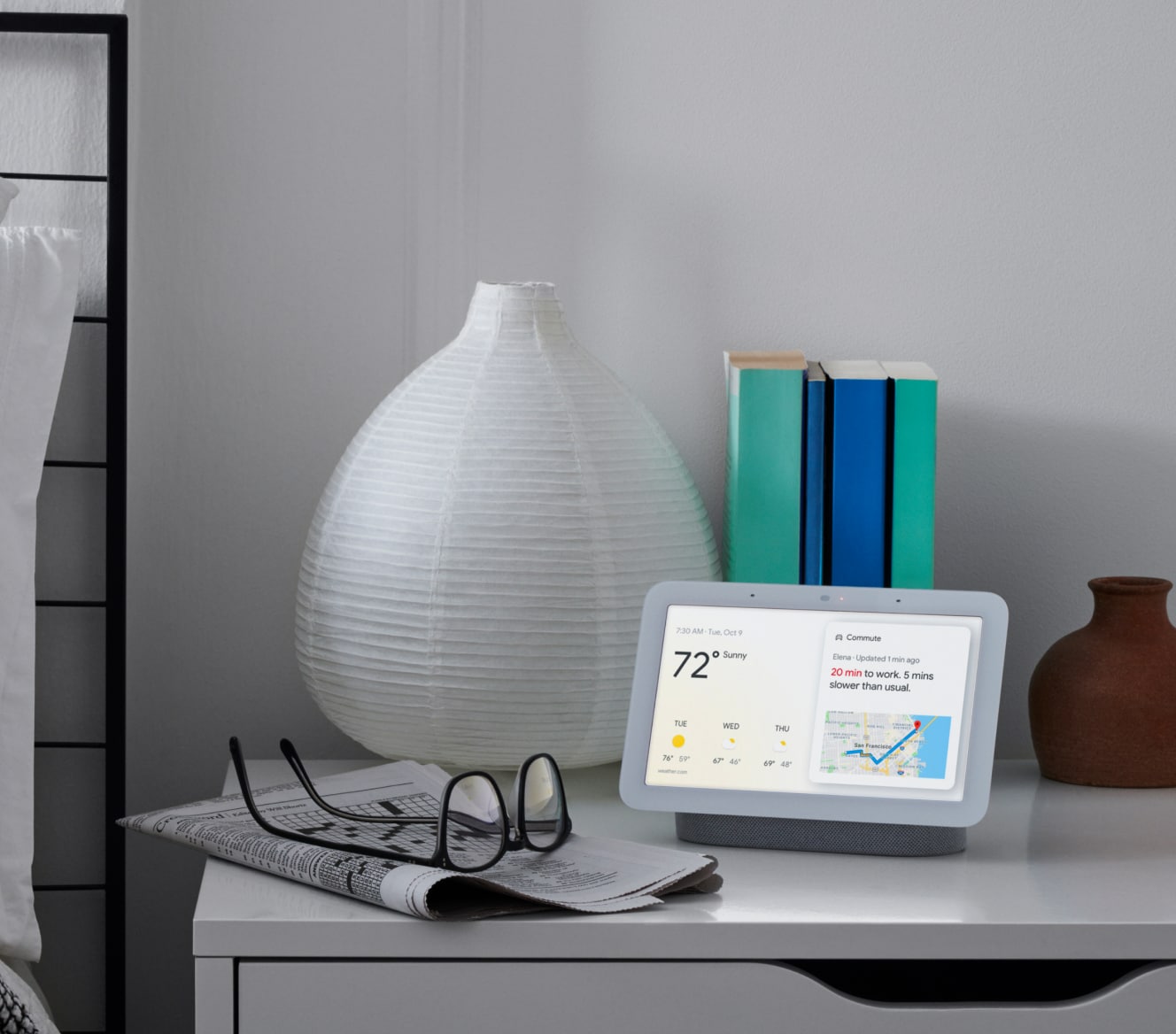 Google Nest Hub 2nd Gen on a bedside table displaying the weather and other stats Google Nest Hub 2nd Gen on a bedside table displaying the weather and other stats