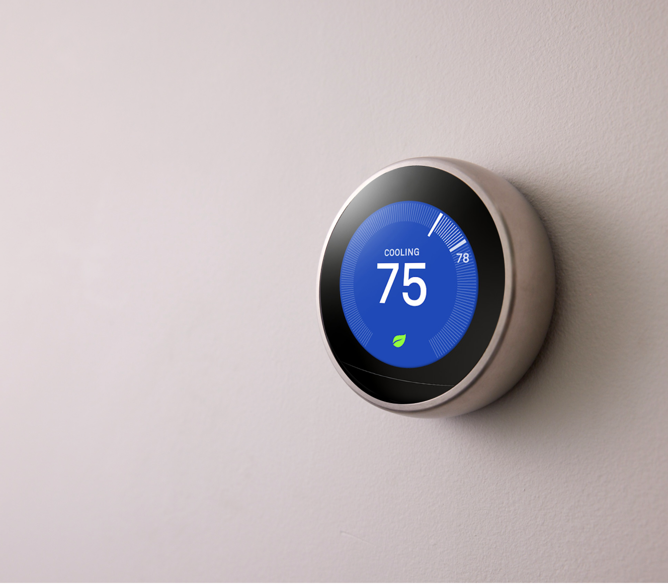 Google Nest Learning Thermostat on a wall Google Nest Learning Thermostat on a wall